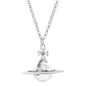Saturn necklace, teardrop colored diamond earrings, Saturn earrings
